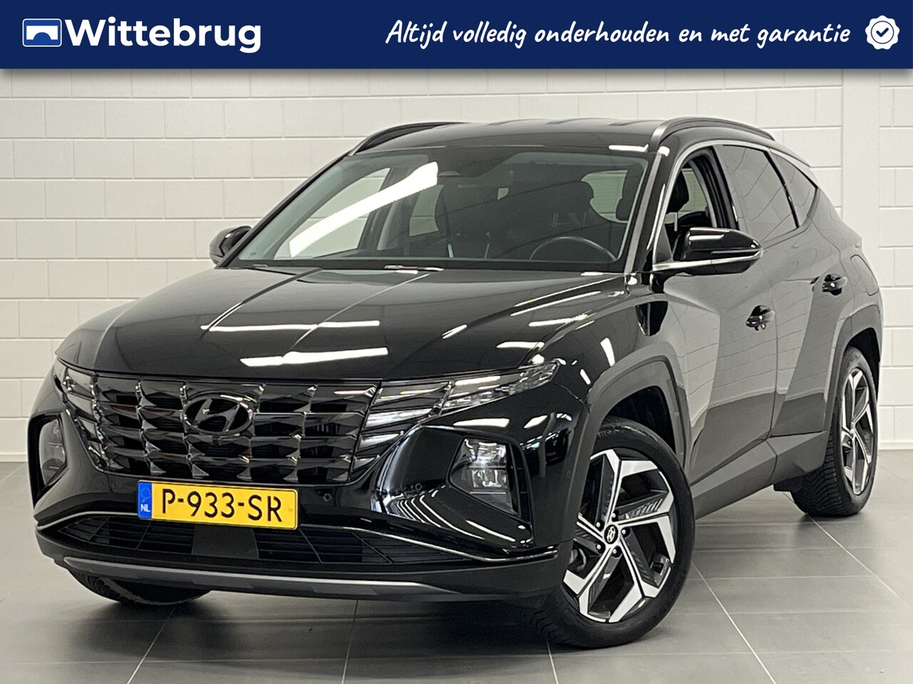 Hyundai Tucson - 1.6 T-GDI PHEV Premium 4WD TREKHAAK | LEDER | NAVIGATIE | FULL LED | KEYLESS - AutoWereld.nl