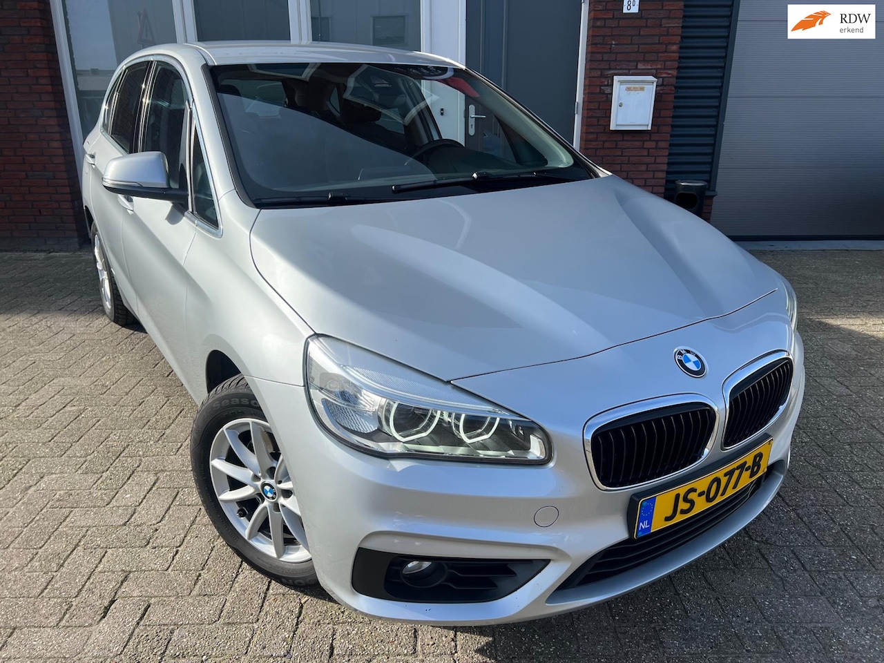 BMW 2-serie Active Tourer - 218i Centennial Executive / Navi / PDC / LED / Cruise - AutoWereld.nl