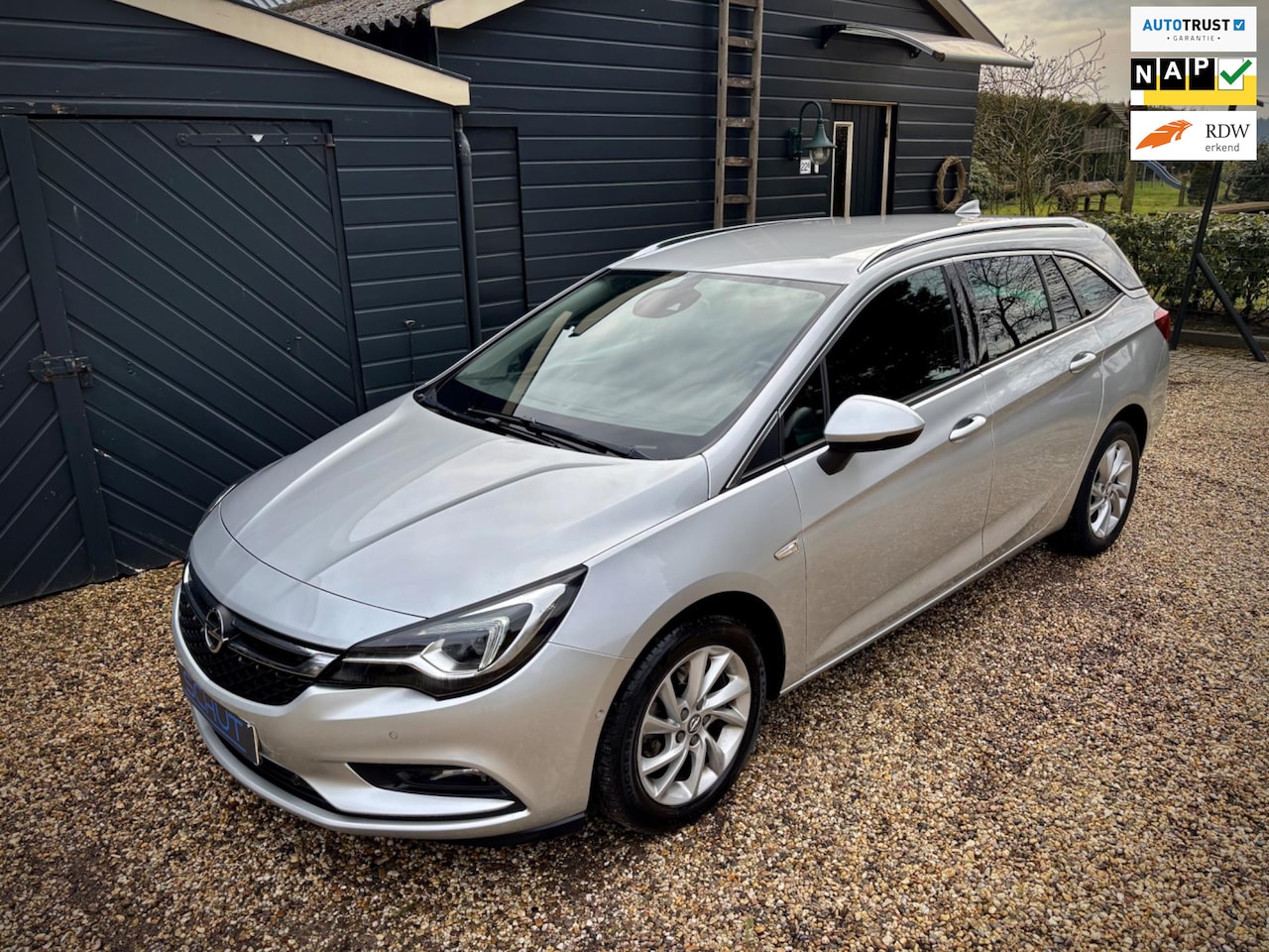 Opel Astra Sports Tourer - 1.4 150pk Innovation | LED | ILUX | CAMERA | CLIMA | ORIG NL AUTO | CRUISE | HALF LEDER - AutoWereld.nl