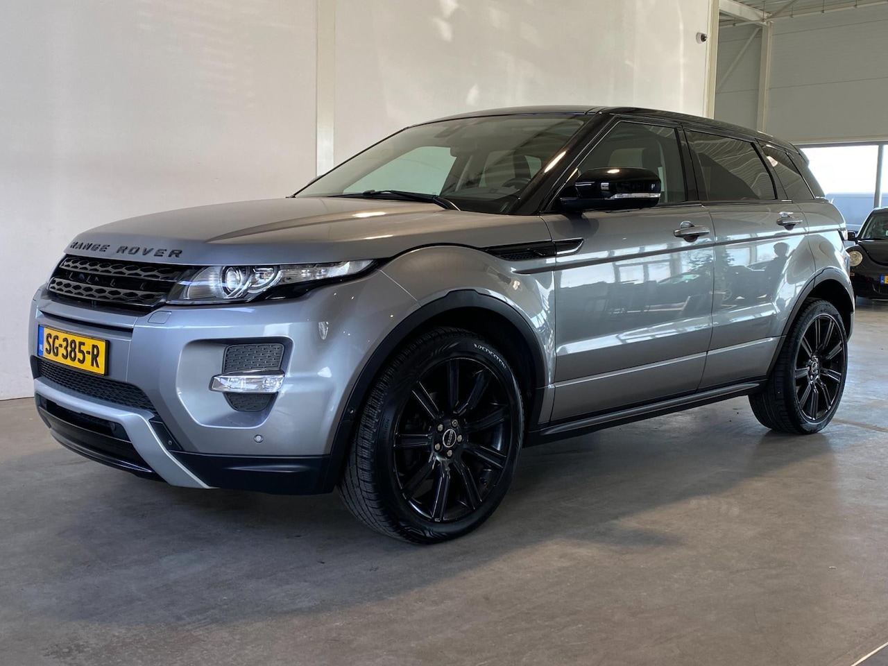 Land Rover Range Rover Evoque - 2.0 Si 4WD Prestige 2.0 Si 4WD Prestige - AutoWereld.nl