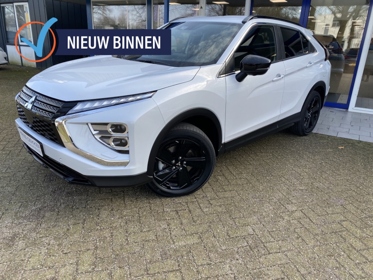 Mitsubishi Eclipse Cross - Automaat navigatie le 2.4 PHEV Black ed. - AutoWereld.nl