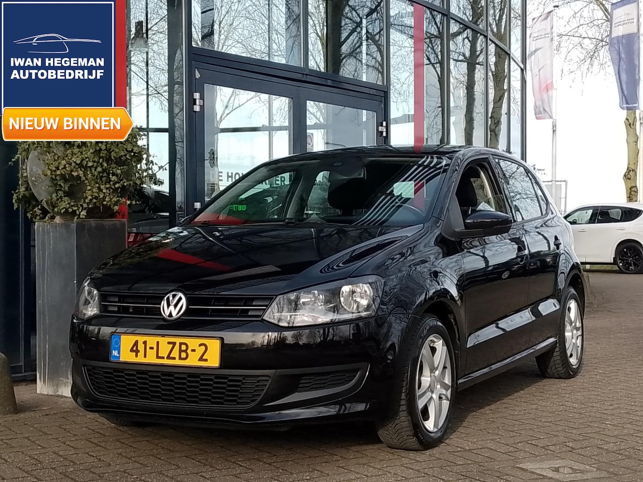 Volkswagen Polo - 1.2 TSI Comfortline AUTOMAAT | Navi | ECC | LM Velgen | Cruise Control | Trekhaak - AutoWereld.nl