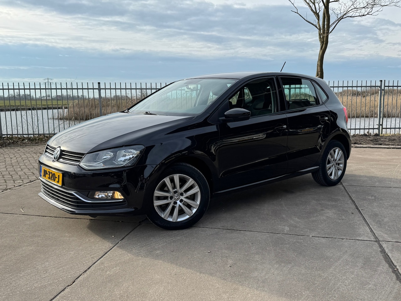 Volkswagen Polo - 1.2 TSI Comfortline | Cruise | Airco | multi media | - AutoWereld.nl