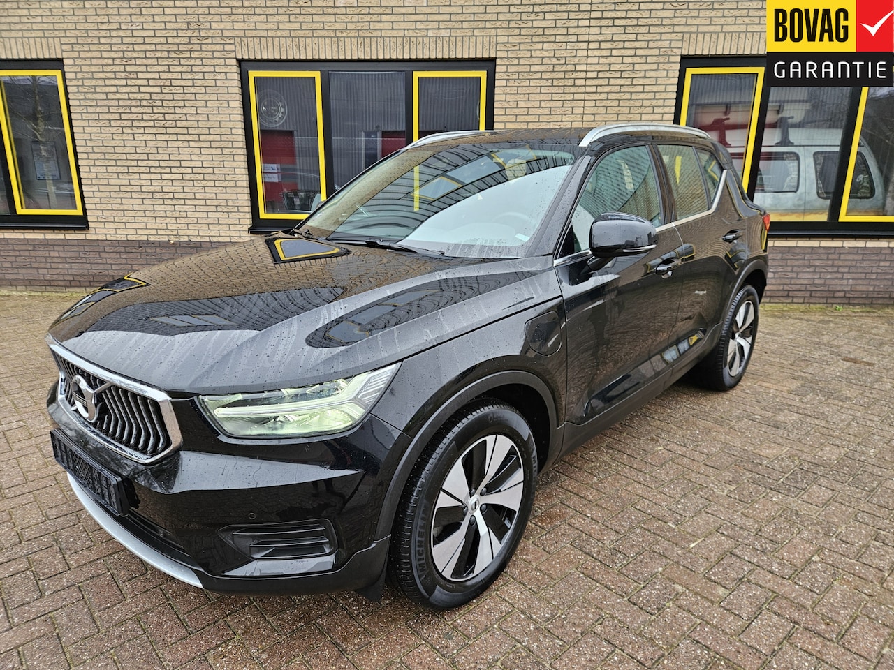 Volvo XC40 - 1.5 T4 Recharge Inscription Business Noir Plug in Hybride , leder zwart - AutoWereld.nl