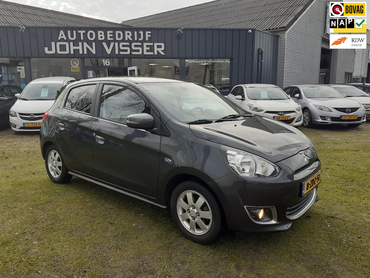 Mitsubishi Space Star - 1.0 Intense *Airco*5drs* - AutoWereld.nl