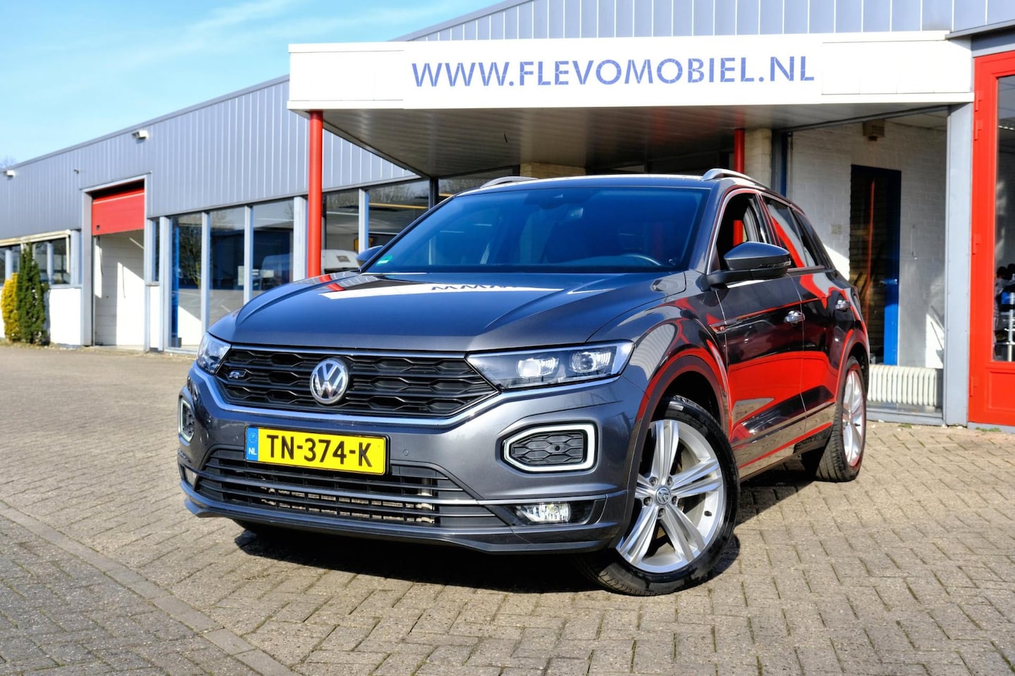 Volkswagen T-Roc - 2.0 TSI 190pk 4Motion R-Line Sport Aut. Virtual.Displ|Navi|1e Eig|Clima|LMV|Cam - AutoWereld.nl