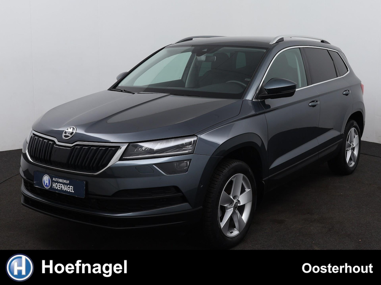 Skoda Karoq - 1.5 TSI ACT Business Edition Automaat | Camera | Stoelverwarming | Navigatie | Parkeersens - AutoWereld.nl