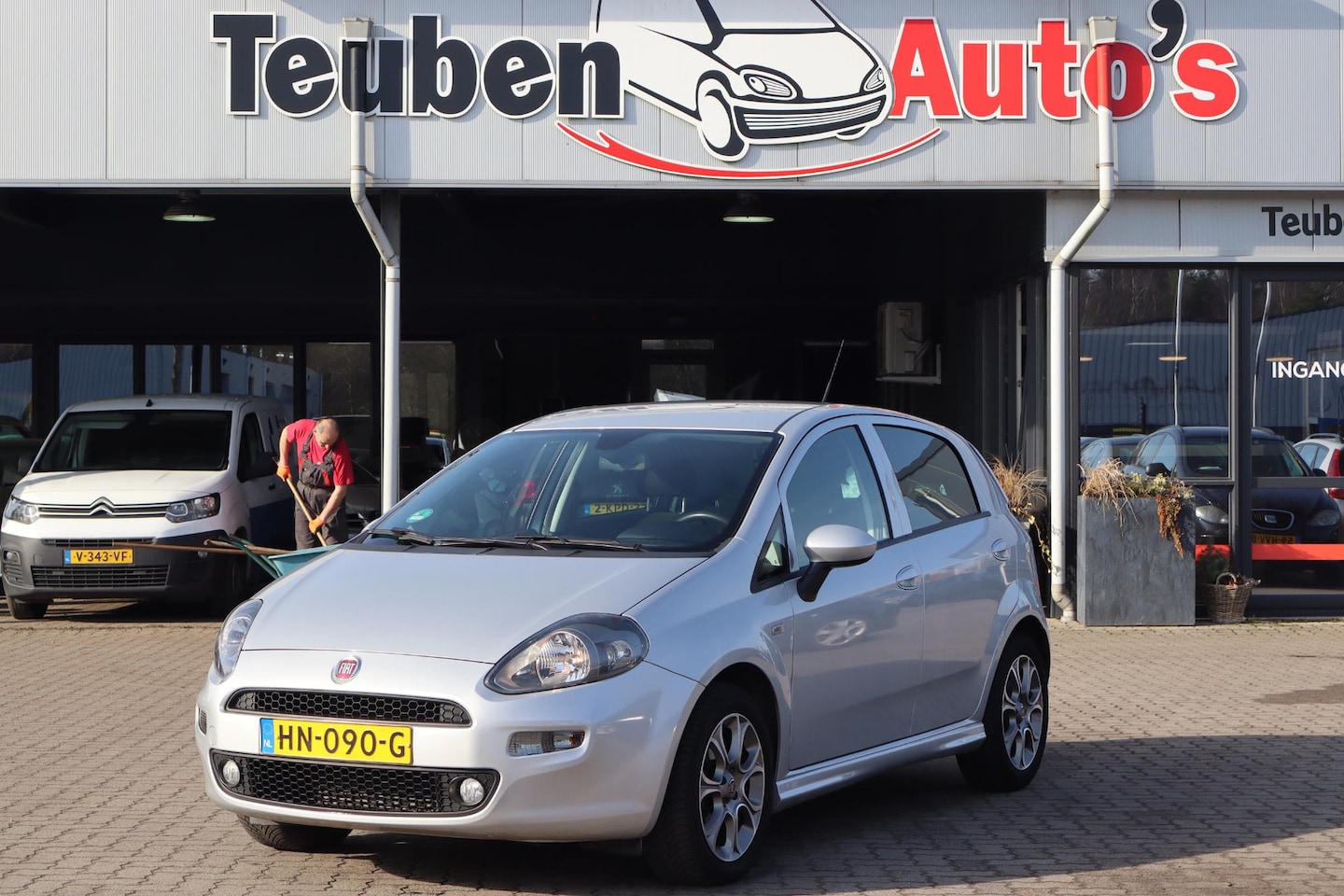 Fiat Punto Evo - 1.3 M-Jet Lounge Climate control, Radio cd speler, Cruise control, Lichtmetalen wielen - AutoWereld.nl