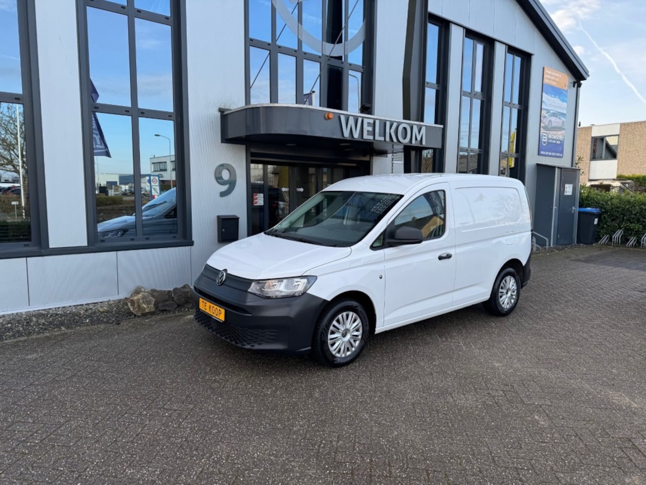 Volkswagen Caddy - 2.0 TDI 101PK climatcntrl, Navi, PDC, Schuifdeur, Licht- en zich - AutoWereld.nl