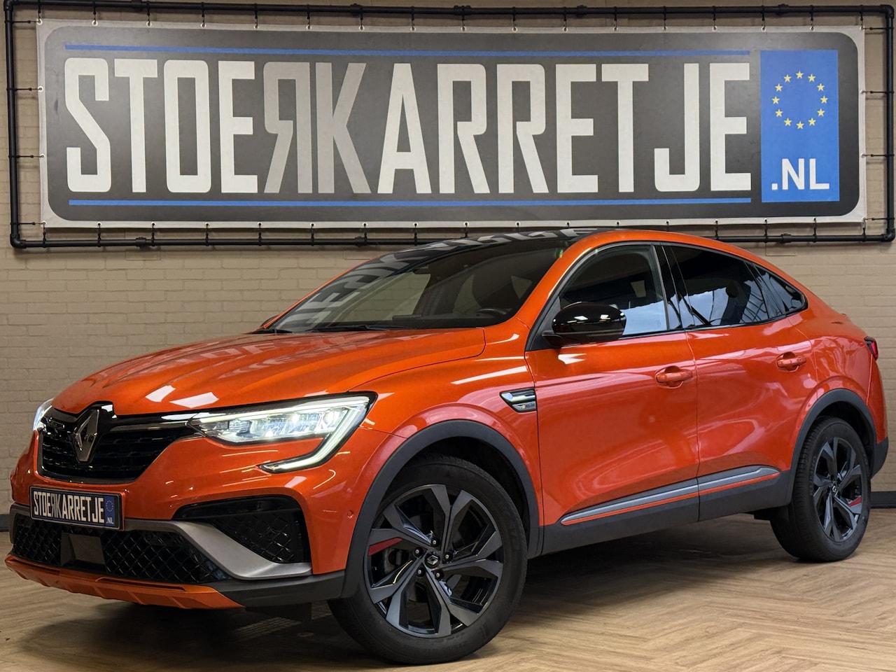 Renault Arkana - 1.6 E-Tech Hybrid 145 R.S. Line 2022 | 9,3" Navi | ACC | Blindspot | 18" | Camera | Stoel - AutoWereld.nl