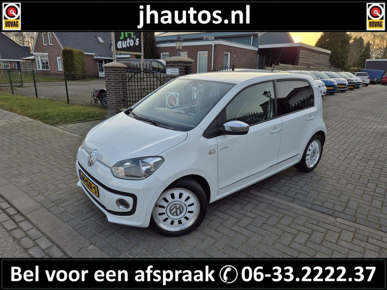 Volkswagen Up! - 1.0 high up! White up! BM NAVI/LEDER/1E-EIG - AutoWereld.nl