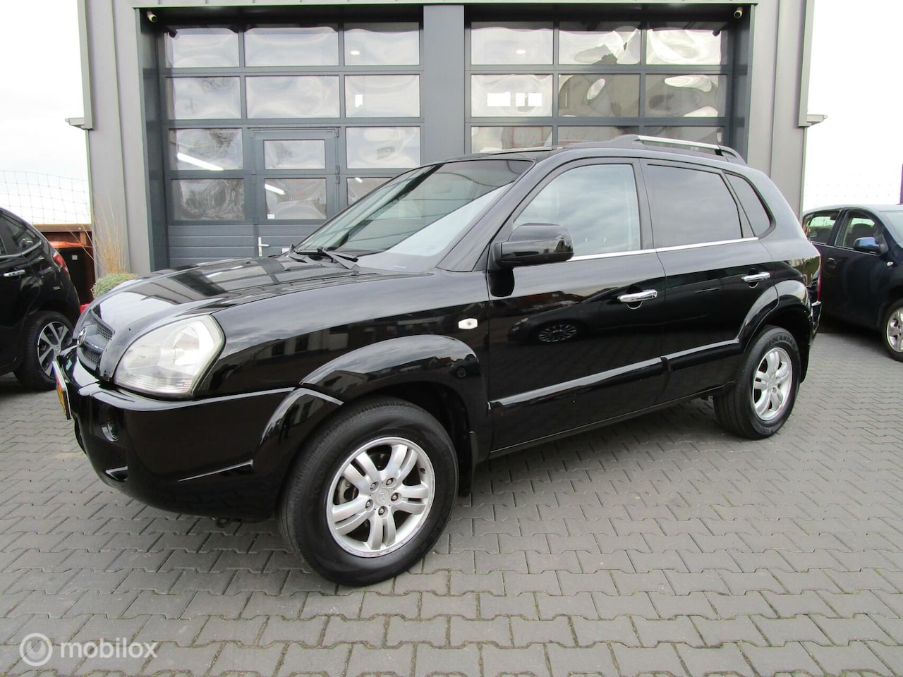 Hyundai Tucson - 2.0i Style Airco Cruise Trekhaak Nw Apk! - AutoWereld.nl