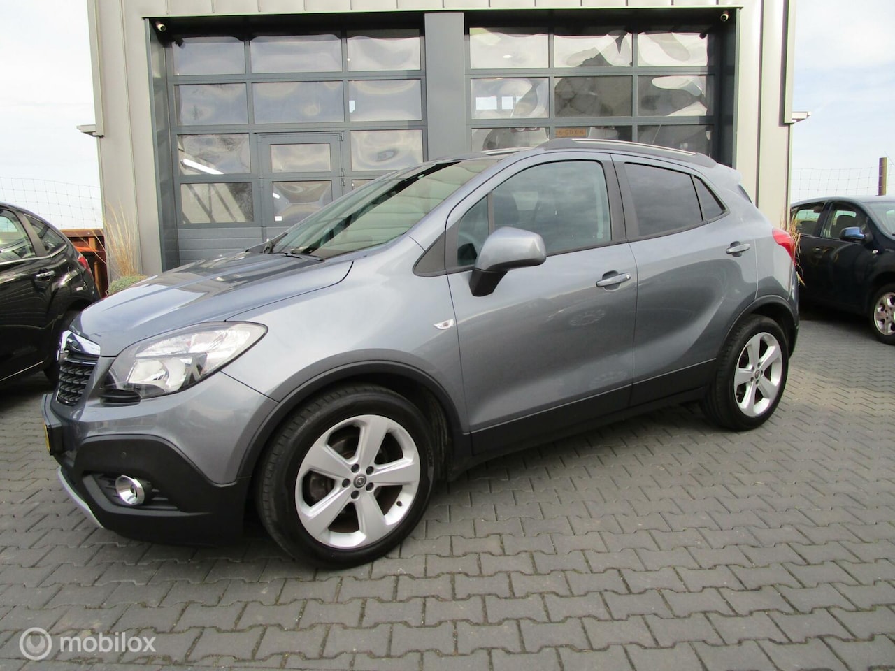 Opel Mokka - 1.4 T Edition 105dkm Airco Cruise Trekhaak Hoge instap - AutoWereld.nl