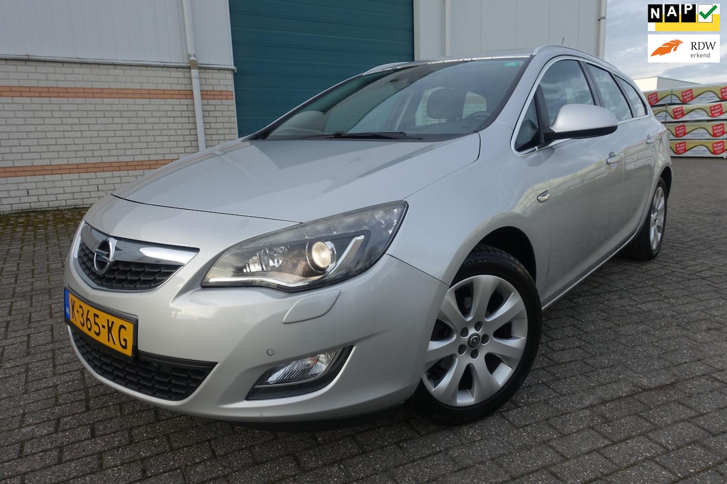 Opel Astra Sports Tourer - 1.4 Turbo - VOL AUTOMAAT - Sport - schuifdak - lm velgen - spec audioinstalatie - AutoWereld.nl