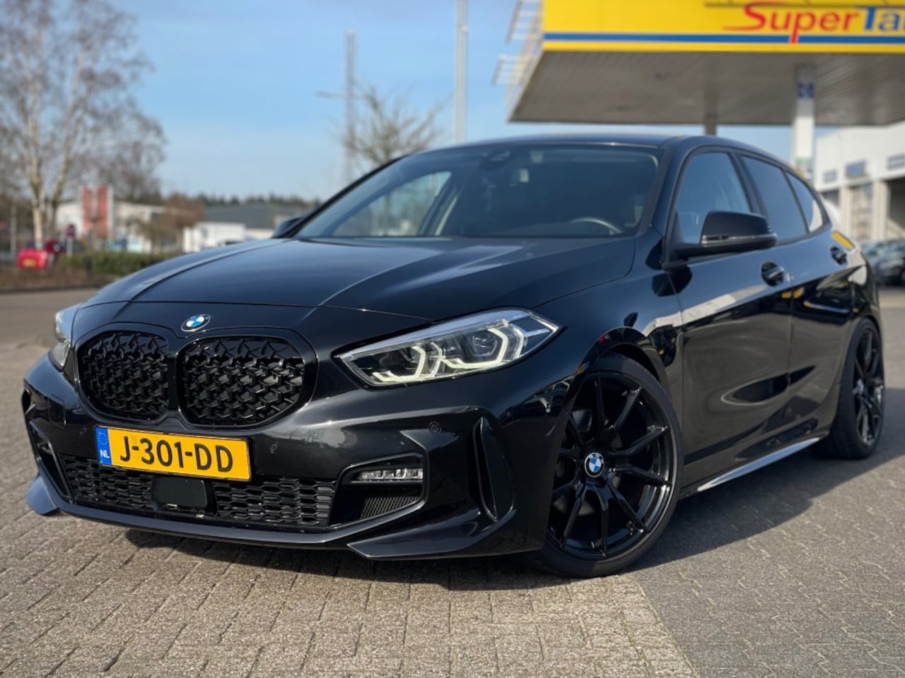 BMW 1-serie - 118I M PAKKET PDC V/A CAMERA  19 INCH SPORTWIELEN - AutoWereld.nl