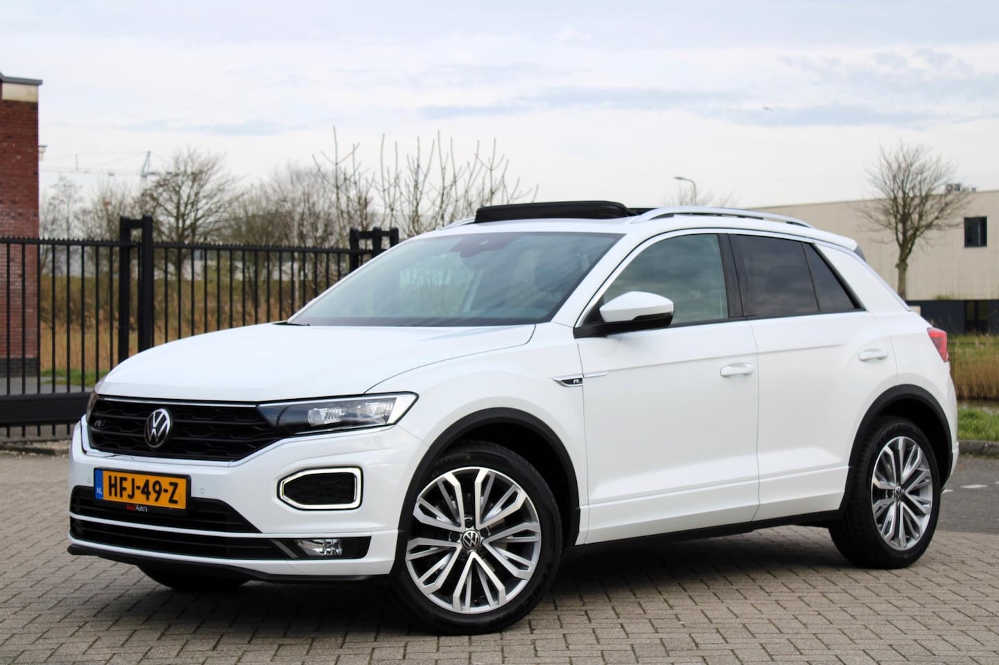 Volkswagen T-Roc - 2.0 TSI 4Motion R Line l Pano l Virtual - AutoWereld.nl