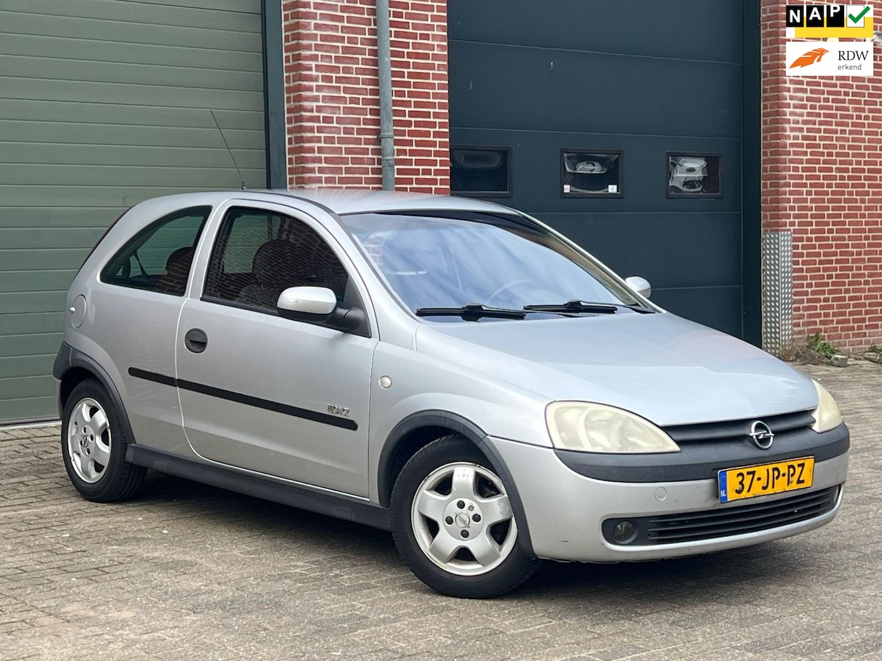 Opel Corsa - 1.2-16V Elegance Airco|Stuurbed|Lmv|Nap|Boekjes - AutoWereld.nl