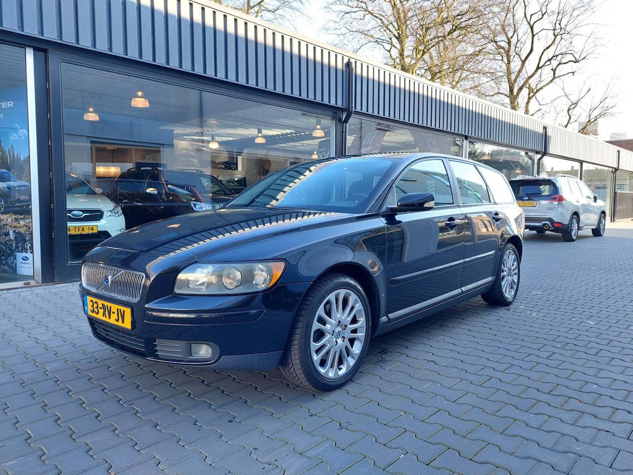 Volvo V50 - 2.4i Momentum Goed oh Originieel NL Clima Cruise Trekhaak 17 inch Spoiler Regensensor NAP - AutoWereld.nl