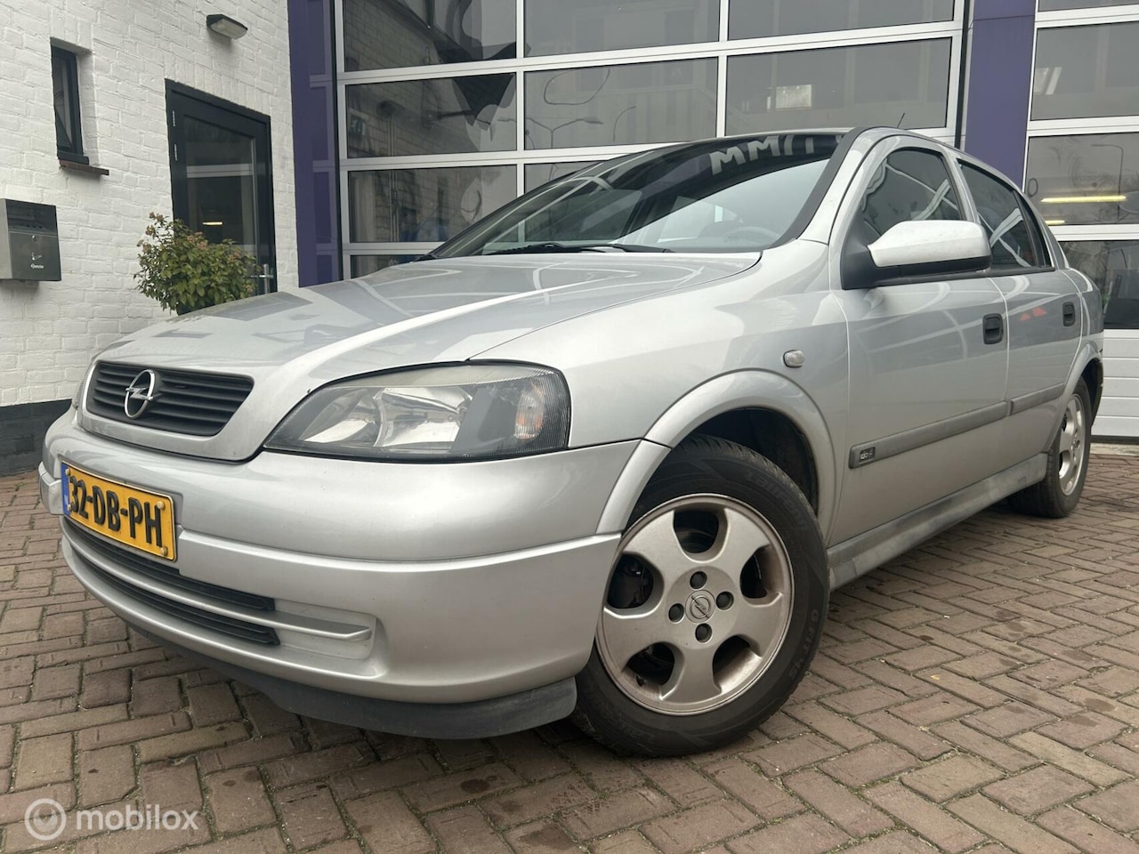 Opel Astra - 1.6-16V Centennial * 5 DRS * AIRCO * TREKHAAK * - AutoWereld.nl