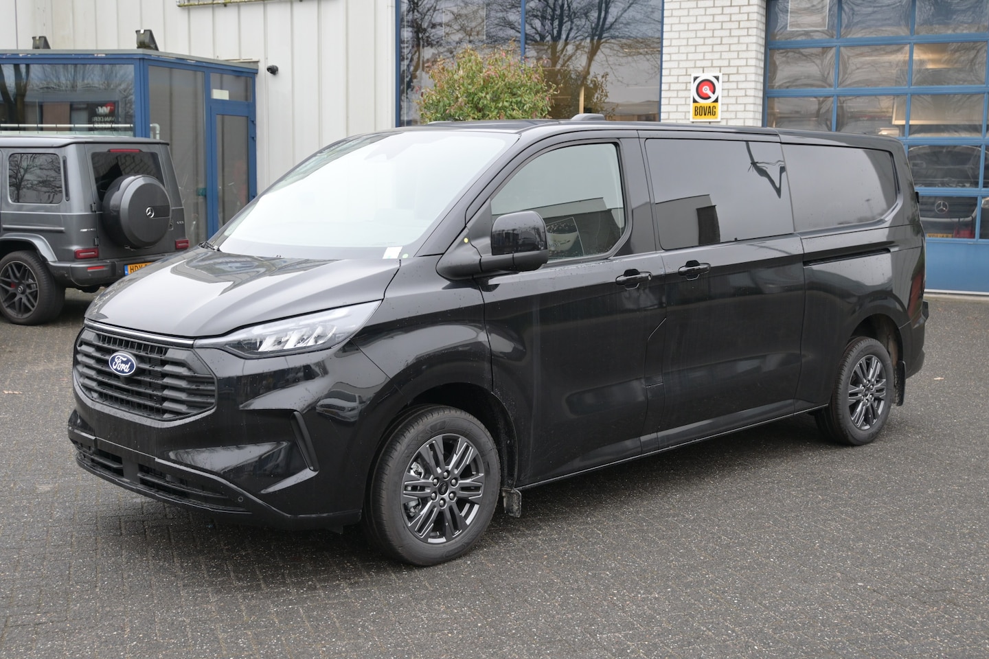 Ford Transit Custom - 300L 2.0 TDCI L2H1 Limited DC Driver Assistance Pack Premium, Middenconsole, Inklapbare tr - AutoWereld.nl