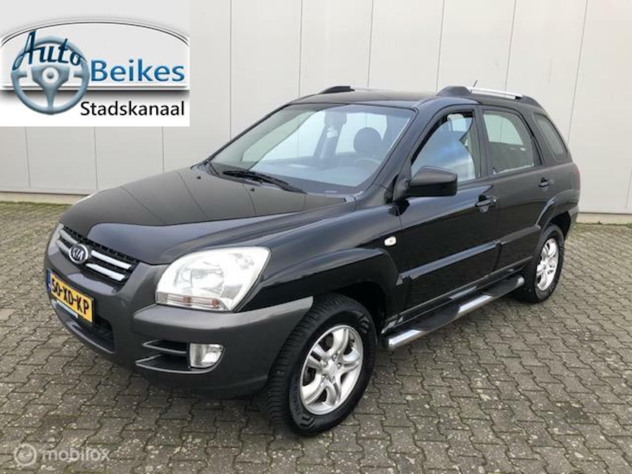 Kia Sportage - 2.0 CVVT X-ecutive 2.0 CVVT X-ecutive - AutoWereld.nl