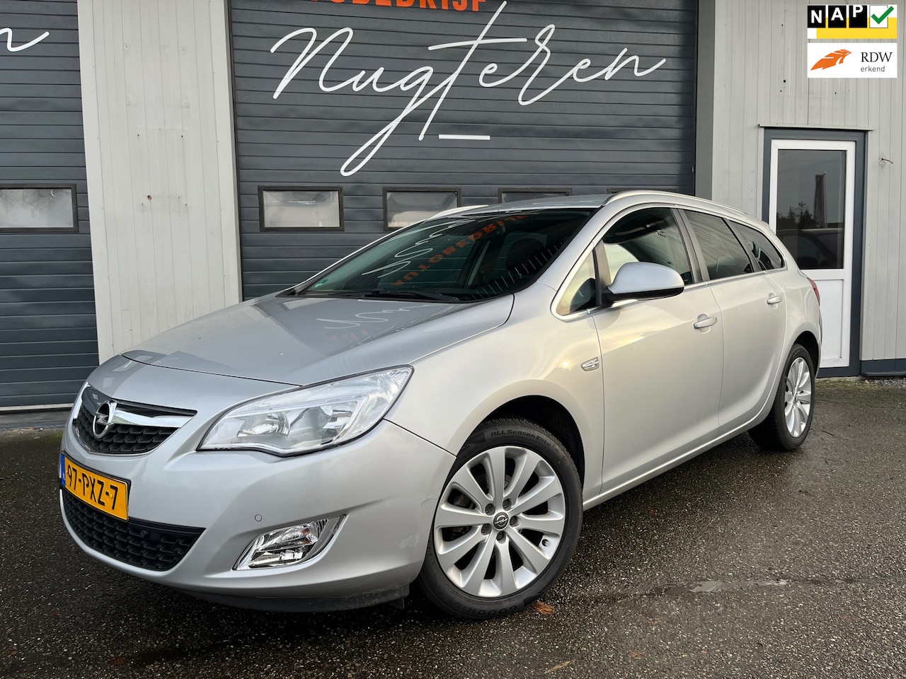 Opel Astra Sports Tourer - 1.4 Cosmo Stuurverw Navi Clima - AutoWereld.nl