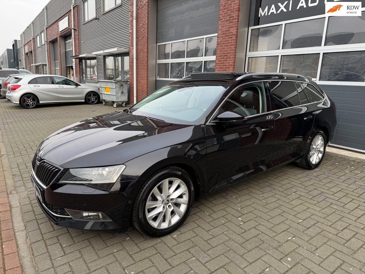 Skoda Superb Combi - 1.5 TSI LED ACC Pano Virtual Leder Canton - AutoWereld.nl