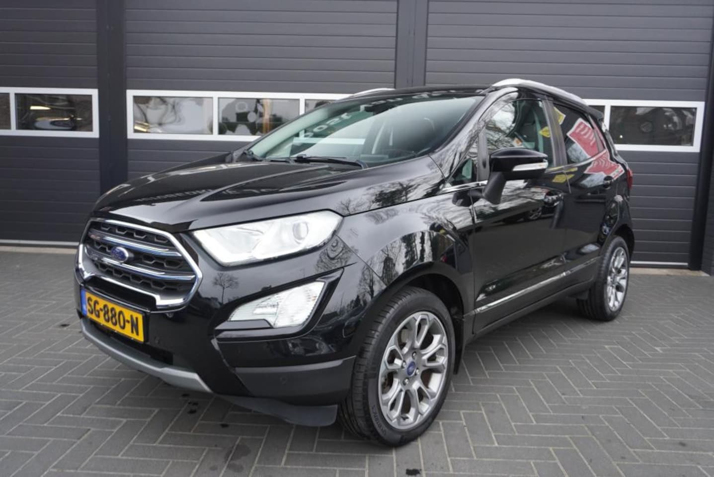 Ford EcoSport - 1.0 EcoBoost Titanium Airco/Camera/CC/Navi/Stuur- Stoelverwarming - AutoWereld.nl