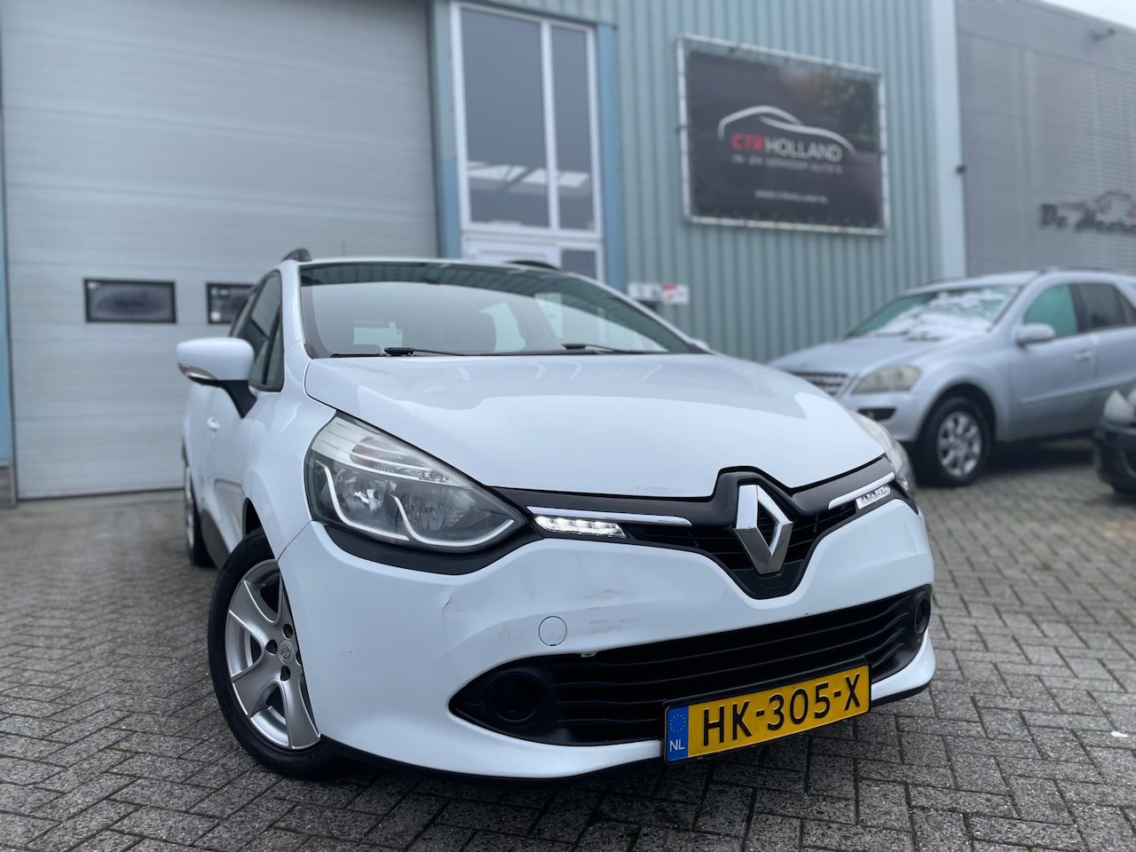 Renault Clio Estate - 1.5 dCi Euro6 (bj 12-2015) *AUTOMAAT* NAVI|AIRCO|LMV - AutoWereld.nl