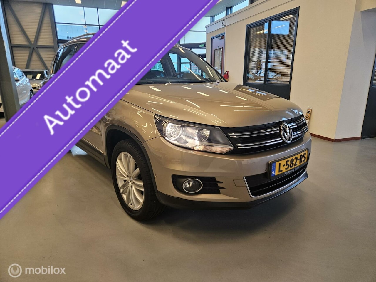 Volkswagen Tiguan - 2.0 TSI Sport&Style 4Motion - AutoWereld.nl