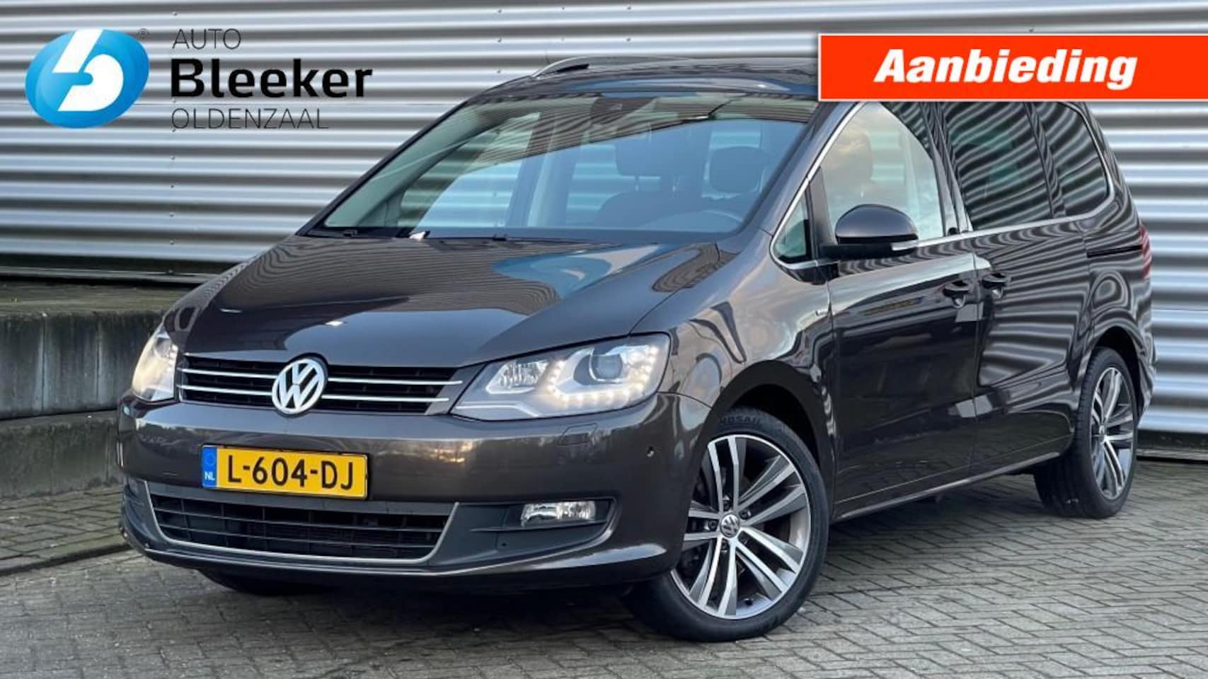 Volkswagen Sharan - 1.4 TSI ComfortLine 7 pers Airco Navi Pano Cruise Stoelverwar - AutoWereld.nl