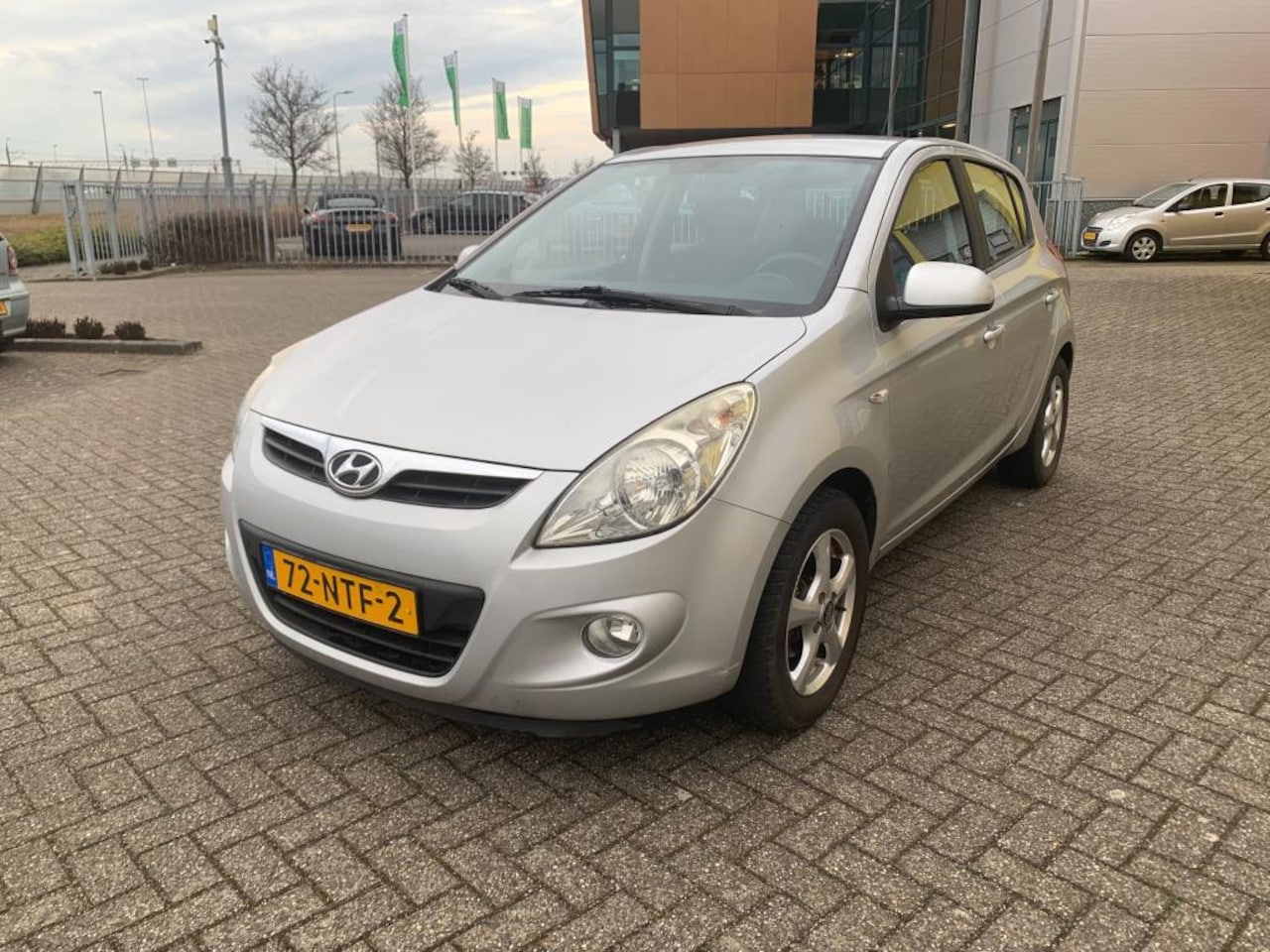 Hyundai i20 - 1.4i Dynamic XL Zilver 2010 Airco 5-drs NAP! - AutoWereld.nl