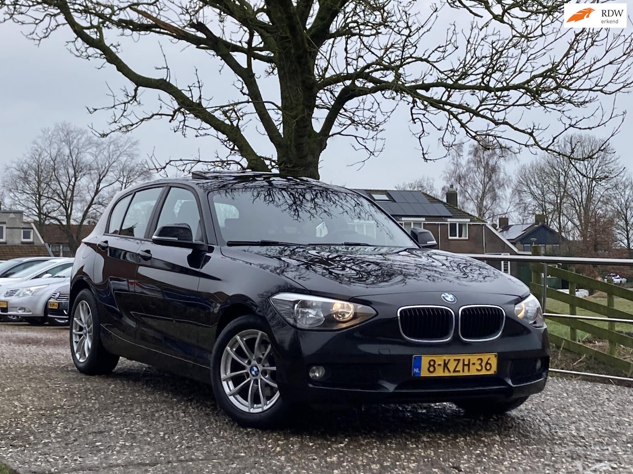 BMW 1-serie - 118d High Executive | Automaat | Open dak + Navi + Clima + Cruise nu €8.975,-!! - AutoWereld.nl