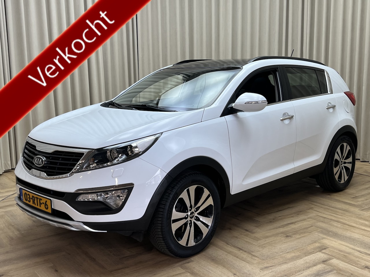 Kia Sportage - 2.0 X-clusive 2wd *Schuif-/Kanteldak* Leder / Trekhaak / Stoelverwarming / Cruise / Naviga - AutoWereld.nl