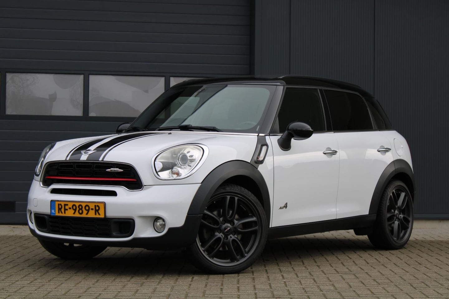 MINI Countryman - Mini 1.6 Cooper S ALL4 JCW [ panoramadak xenon leder navigatie pdc ] 184 PK - AutoWereld.nl