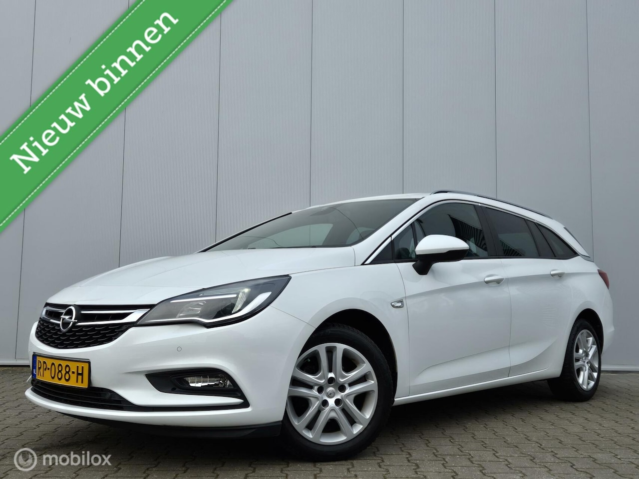 Opel Astra Sports Tourer - 1.4 BUSINESS+/LED/TREKHAAK/CARPLAY/NAVI/BLUETOOTH - AutoWereld.nl