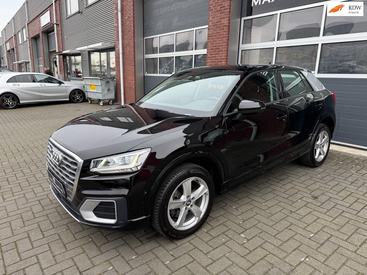 Audi Q2 - 1.4 TFSI CoD Sport S-Tronic LED Navi Stoelvw PDC - AutoWereld.nl