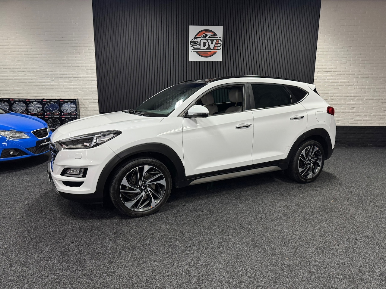 Hyundai Tucson - 1.6 T-GDI Premium 1.6 T-GDI Premium, APPLE CAR PLAY, WIT LEER, PANO DAK, MEMORY, STUURVERW, STOELVERW, - AutoWereld.nl