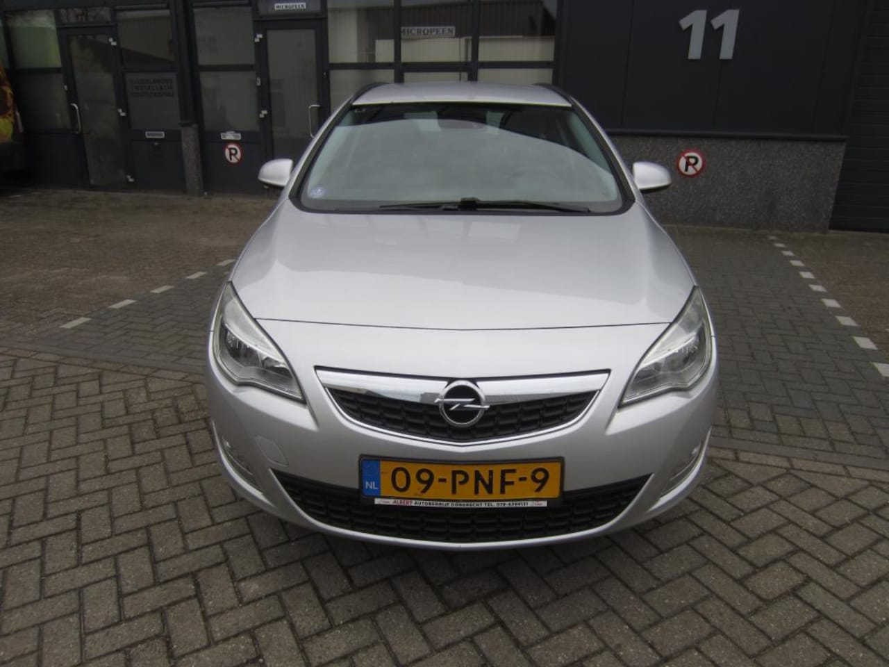 Opel Astra Sports Tourer - 1.4 Turbo Edition 2011 Airco Navi NAP! APK! - AutoWereld.nl