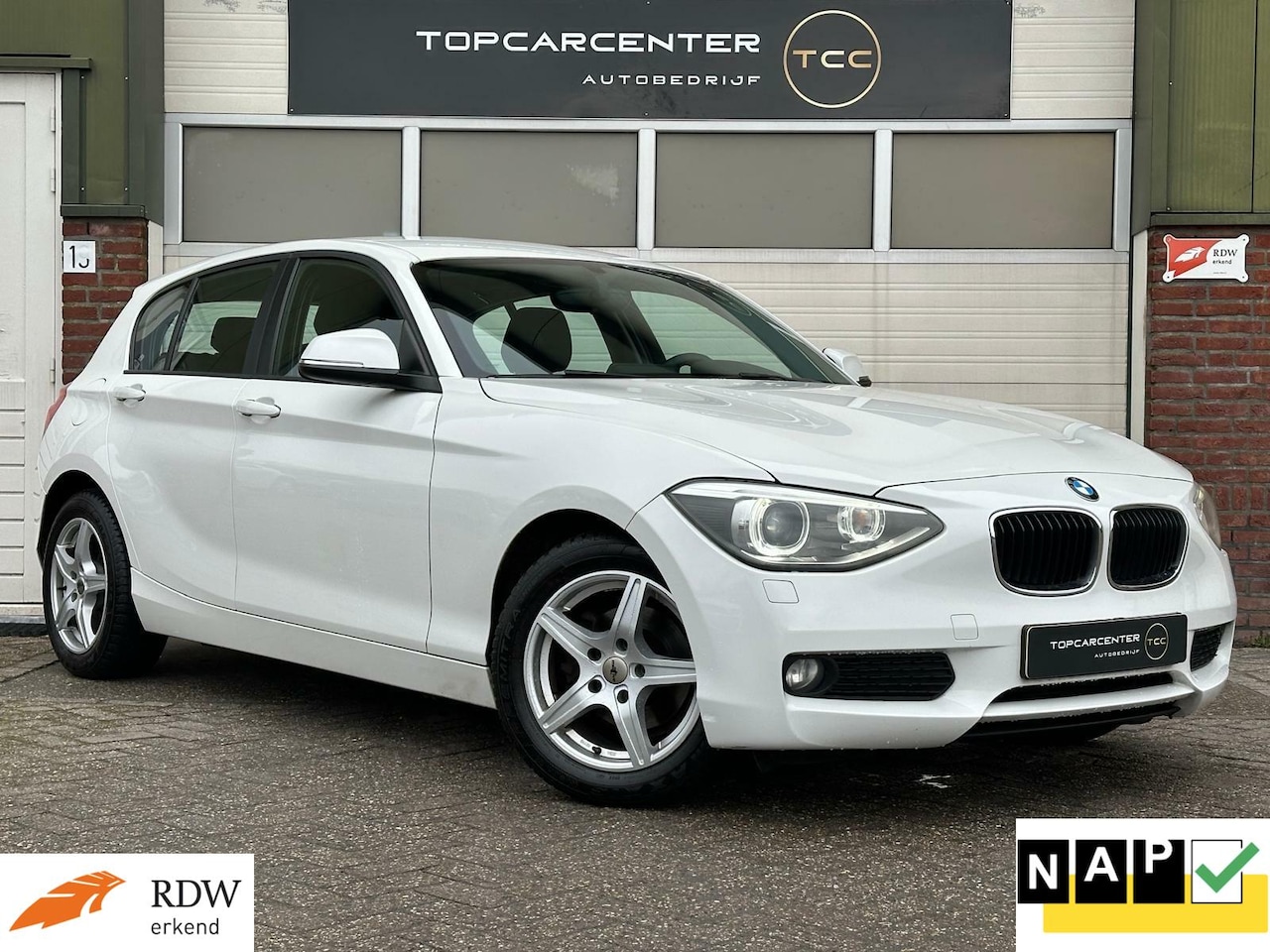 BMW 1-serie - 116i/AIRCO/NAVI/5DRS/CRUISE/LED/LM.VELG/APK/NAP - AutoWereld.nl