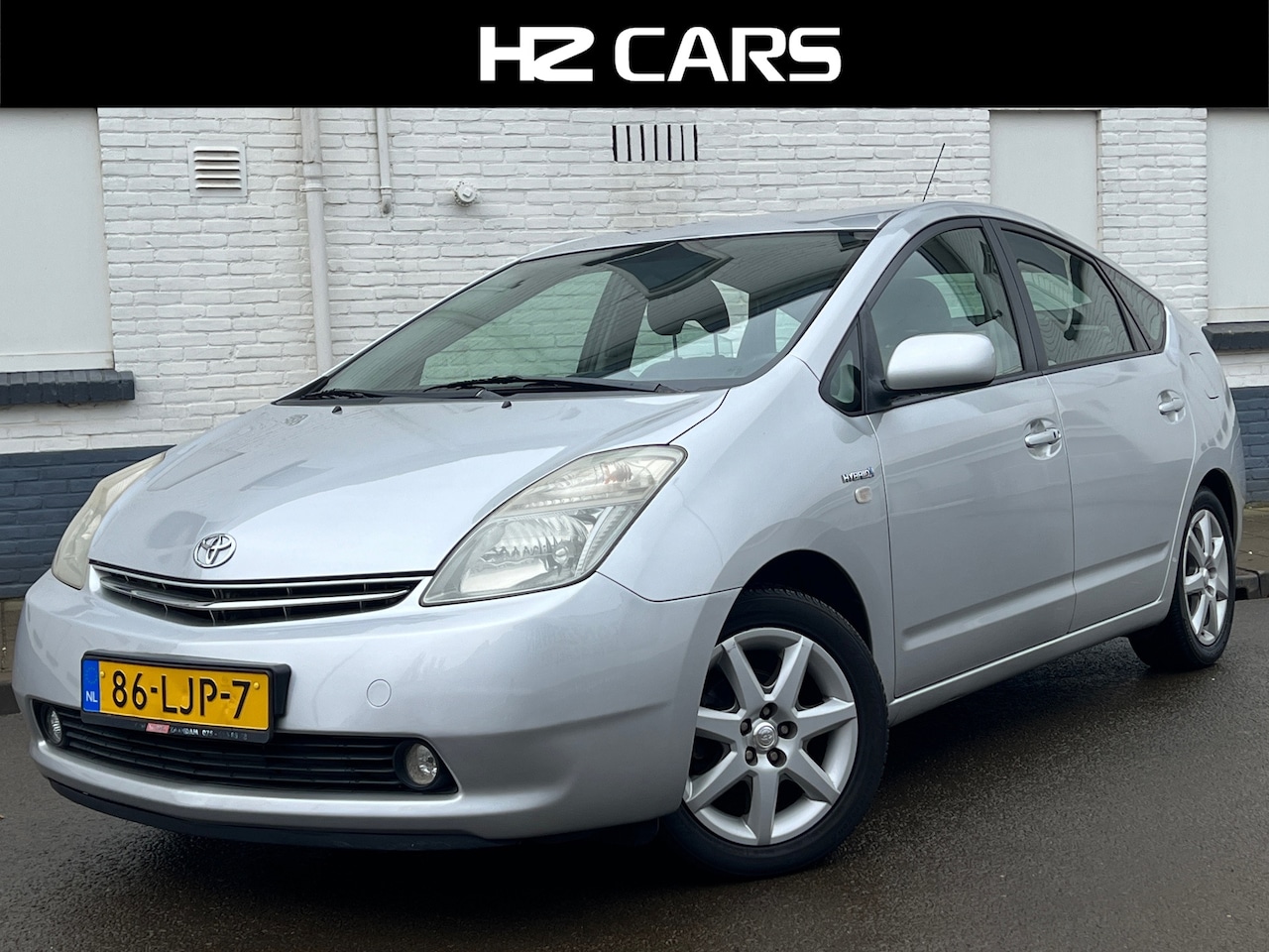 Toyota Prius - 1.5 VVT-i Comfort|Automaat|JBL|Keyless|Cruise|Navi|Elektr.pakket - AutoWereld.nl