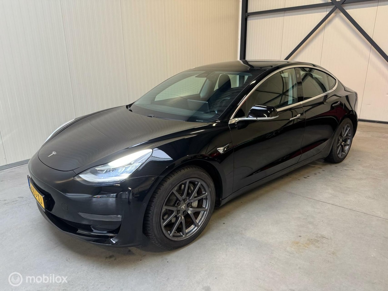 Tesla Model 3 - Long Range RWD Long Range AWD 75 kWh - AutoWereld.nl