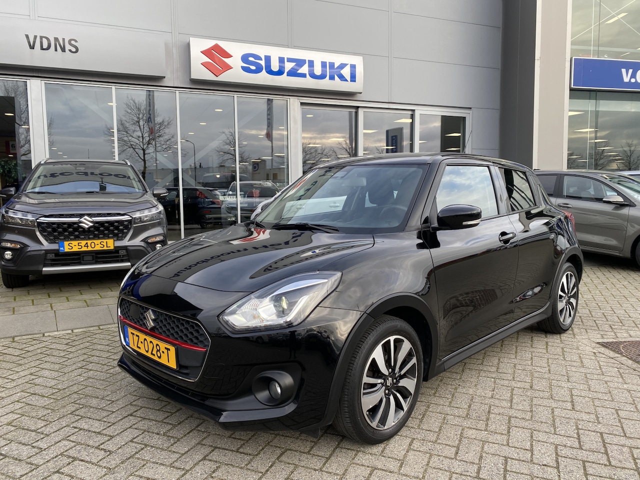 Suzuki Swift - 1.2 Stijl Smart Hybrid | Navi | Camera | Info 0492588976 - AutoWereld.nl