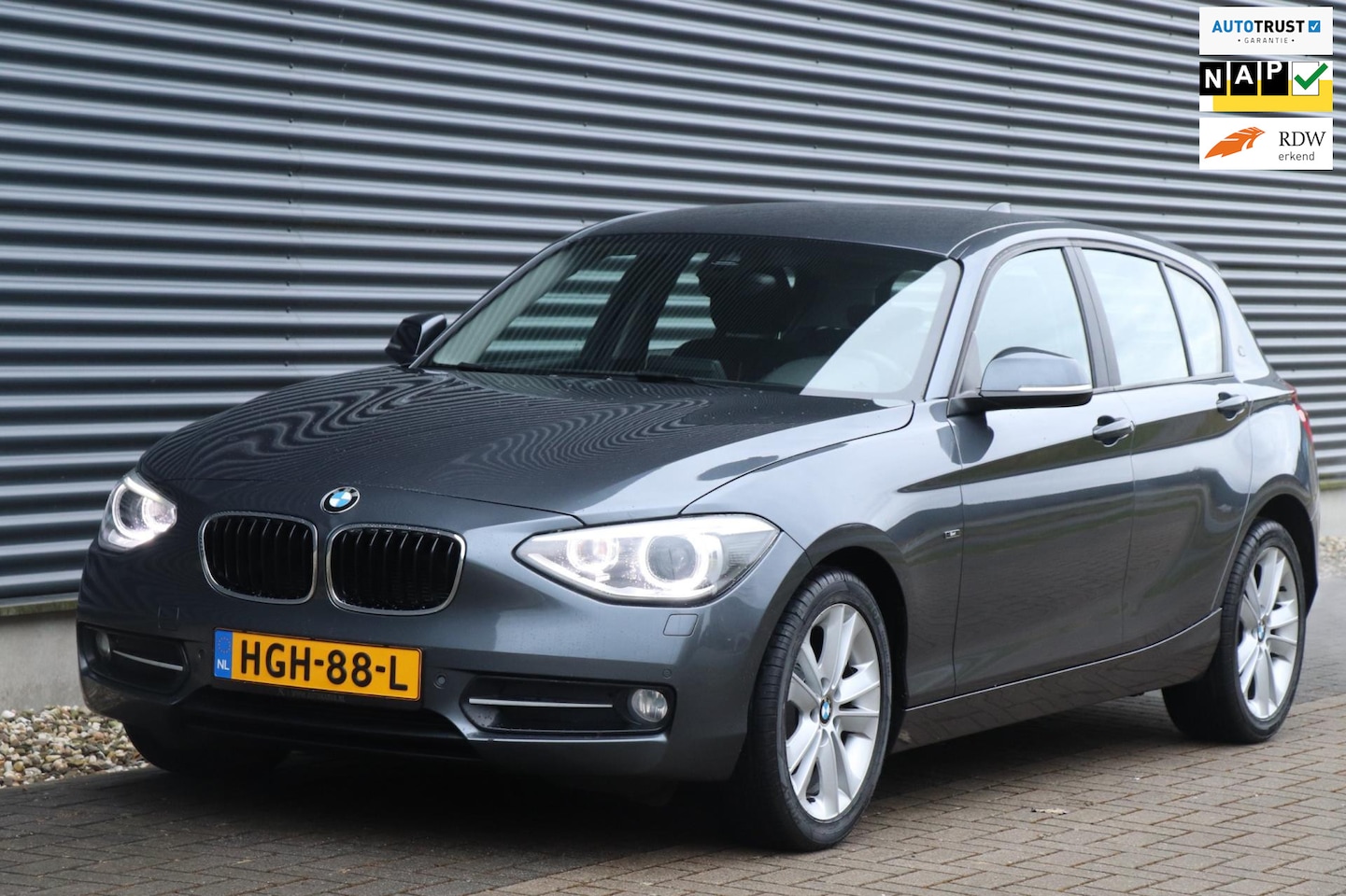 BMW 1-serie - 116i High Executive | Sport - Navi - Camera - Zeer nette auto! - AutoWereld.nl