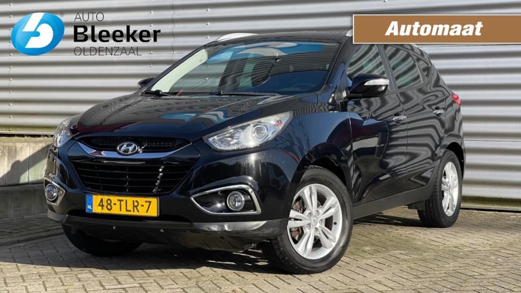 Hyundai ix35 - 2.0I 4WD Style Automaat Airco Cruise Navi Trekhaak - AutoWereld.nl