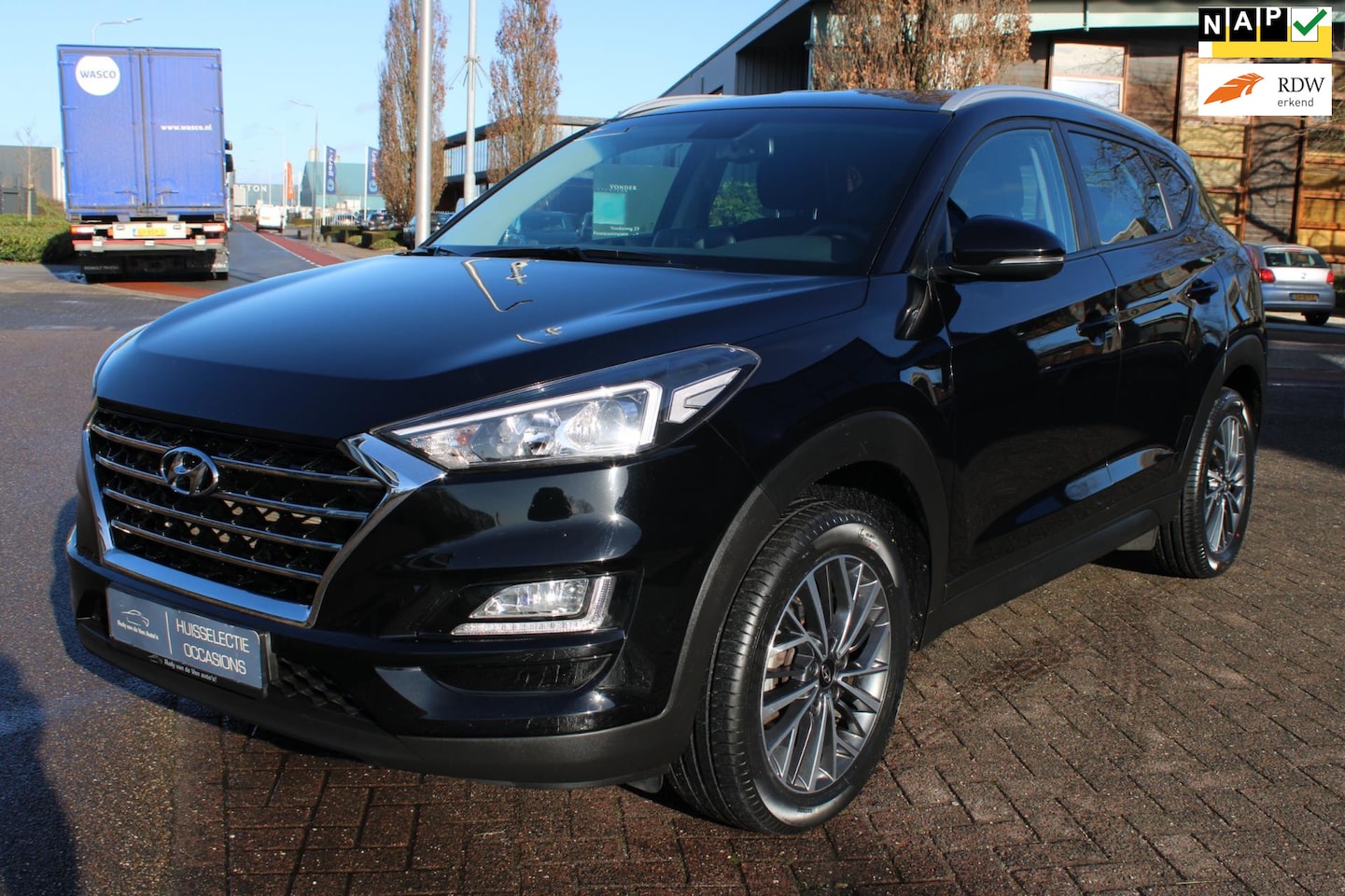 Hyundai Tucson - 1.6 Level 3 132PK Premium ZWART - AutoWereld.nl