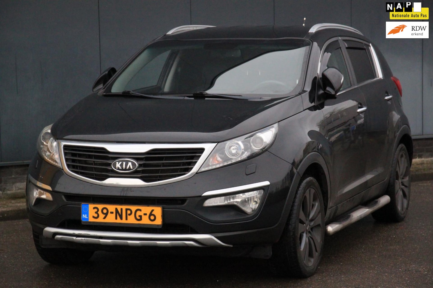 Kia Sportage - 2.0 X-clusive Xenon/Leer/Parkeersensor/Navigatie/18"inch Lmv - AutoWereld.nl