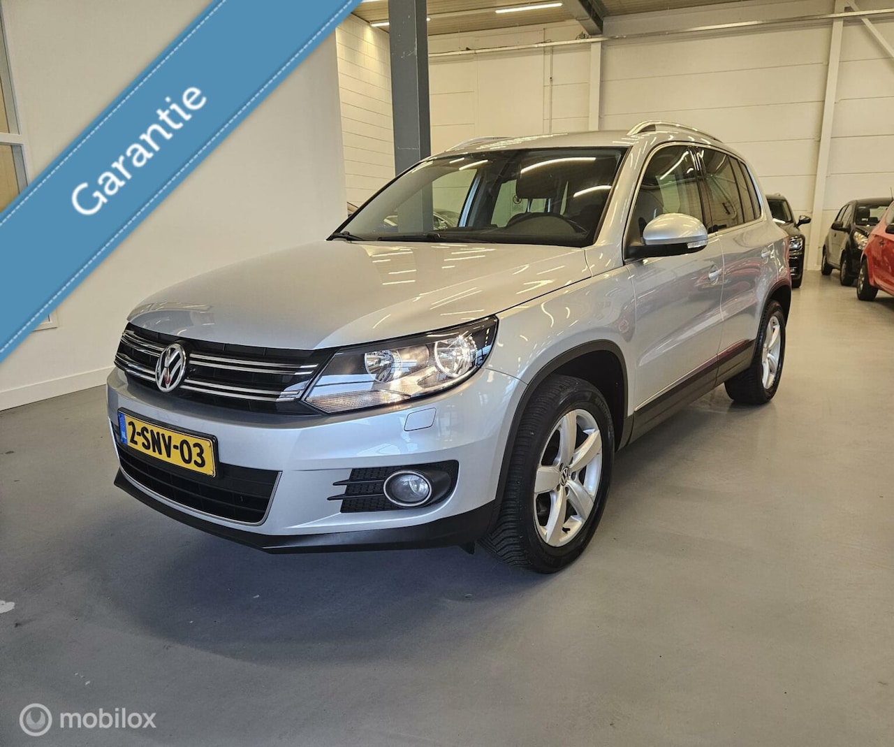 Volkswagen Tiguan - 1.4 TSI Sport&Style R-Line Edition (2013) - AutoWereld.nl