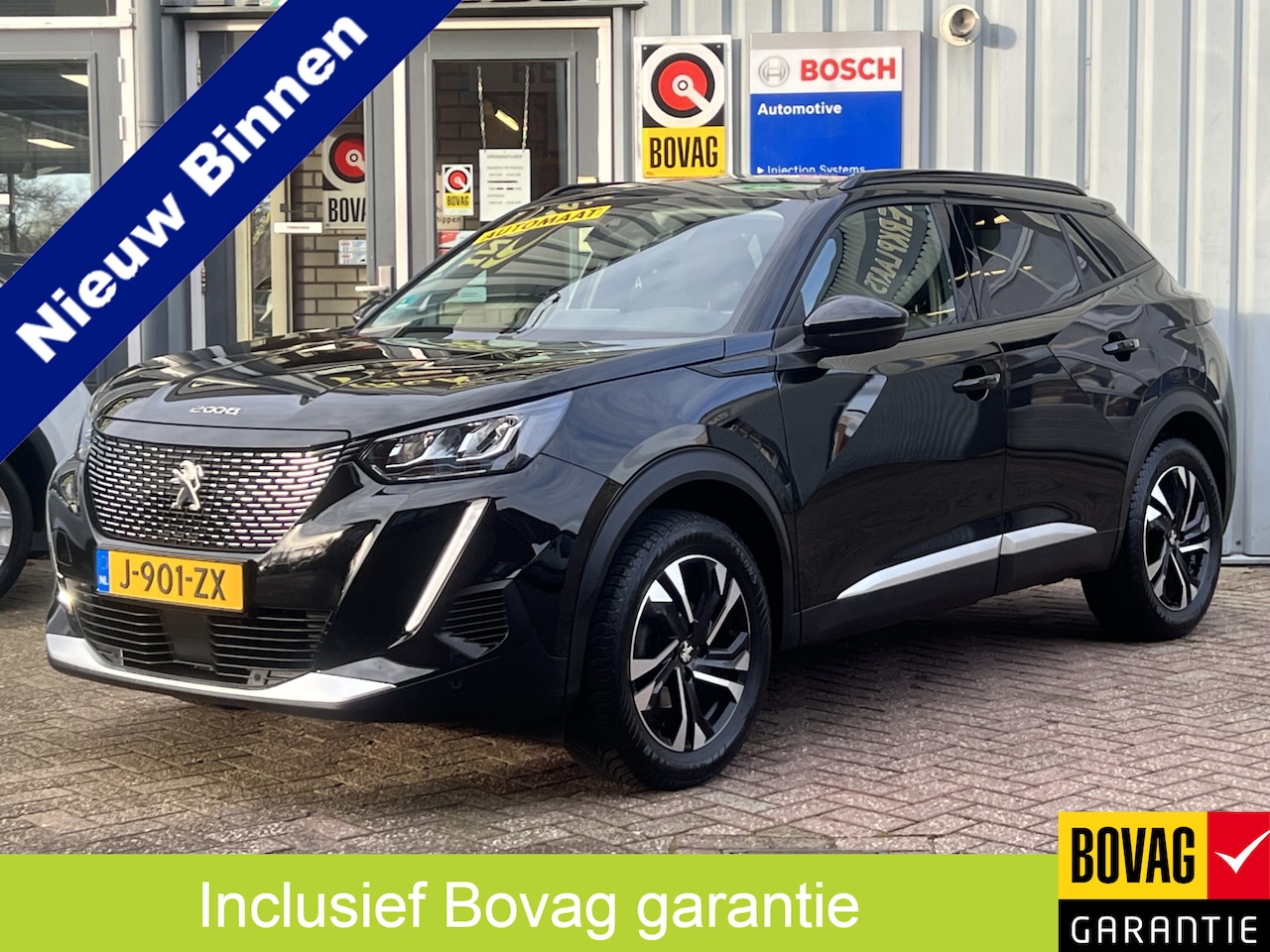 Peugeot 2008 - 1.2 PureTech Allure | AUTOMAAT | NAVIGATIE | TREKHAAK | NIEUW STAAT | - AutoWereld.nl