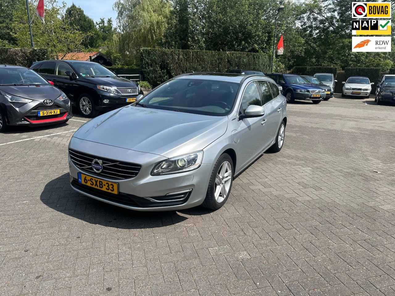 Volvo V60 - 2.4 D6 AWD Plug-In Hybrid Summum 2.4 D6 AWD Plug-In Hybrid Summum , leer , navigatie - AutoWereld.nl